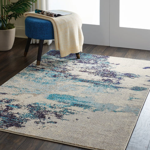 2' X 4' Ivory And Teal Blue Abstract Power Loom Non Skid Area Rug